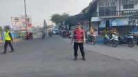 Cegah Kemacetan di Pagi Hari, Bhabinkamtibmas Polsek Telagasari Lakukan Gatur